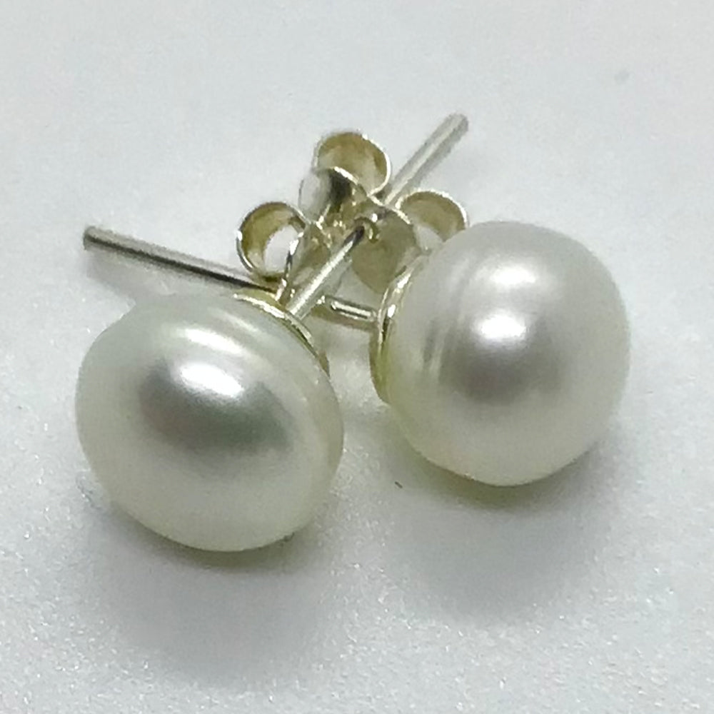 "Peace" - Single White Pearl Earring